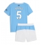 Manchester City John Stones #5 Thuis tenue voor kinderen 2025-26 Korte Mouwen (+ broek)