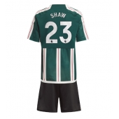 Manchester United Luke Shaw #23 Uit tenue voor kinderen 2023-24 Korte Mouwen (+ broek)
